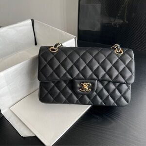 CHANEL Black Quilted Shoulder Bag with Gold Accents